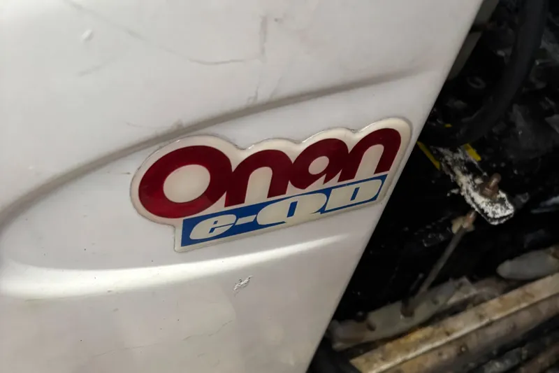Slide: The Image of Onan generator label on a 2004 Riviera 4000 boat engine. - 39