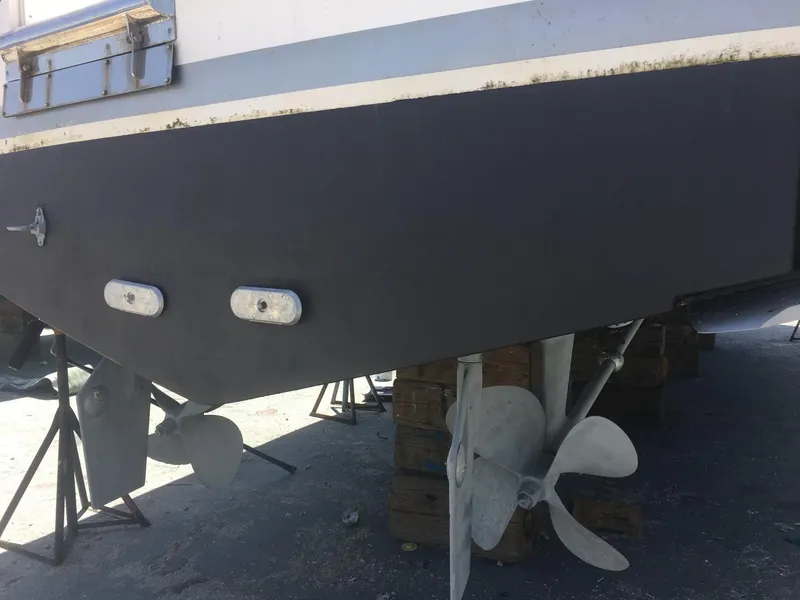 Slide: The Image of 2004 Riviera 4000 boat hull and propellers on dry dock. - 7