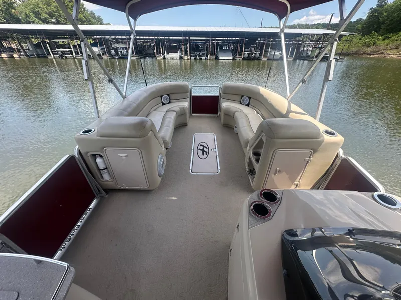 Slide: The Image of 2012 Harris FloteBote Grand Mariner SEL 250 pontoon boat interior with seating and canopy. - 19