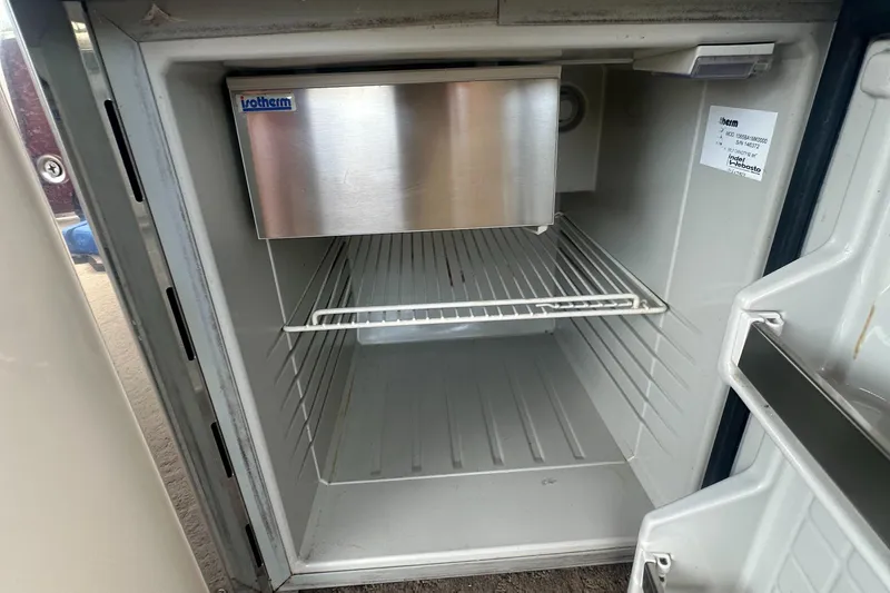 Slide: The Image of Open mini fridge inside 2012 Harris FloteBote Grand Mariner SEL 250 boat. - 31