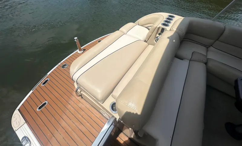 Slide: The Image of 2012 Harris FloteBote Grand Mariner SEL 250 with beige seating and wooden deck. - 35