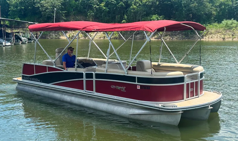 Slide: The Image of 2012 Harris FloteBote Grand Mariner SEL 250 pontoon boat with red canopy on a lake. - 9