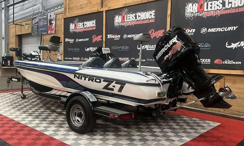 Slide: The Image of 2015 Nitro Z Series Z-7 boat with Mercury Pro XS engine in showroom. - 5
