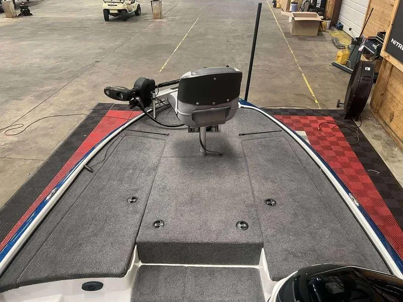 Slide: The Image of 2015 Nitro Z Series Z-7 boat interior with gray carpet and mounted equipment. - 6
