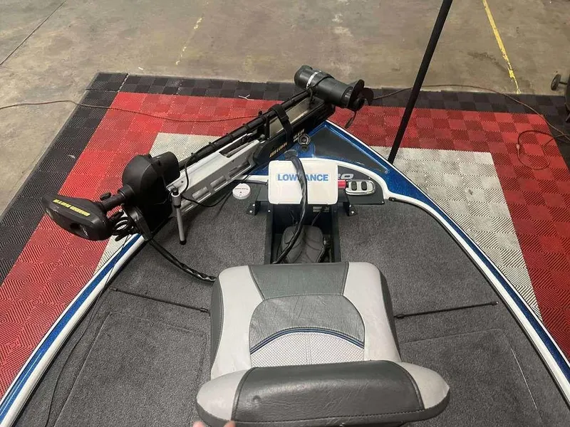 Slide: The Image of 2015 Nitro Z Series Z-7 boat interior with trolling motor and Lowrance electronics. - 7