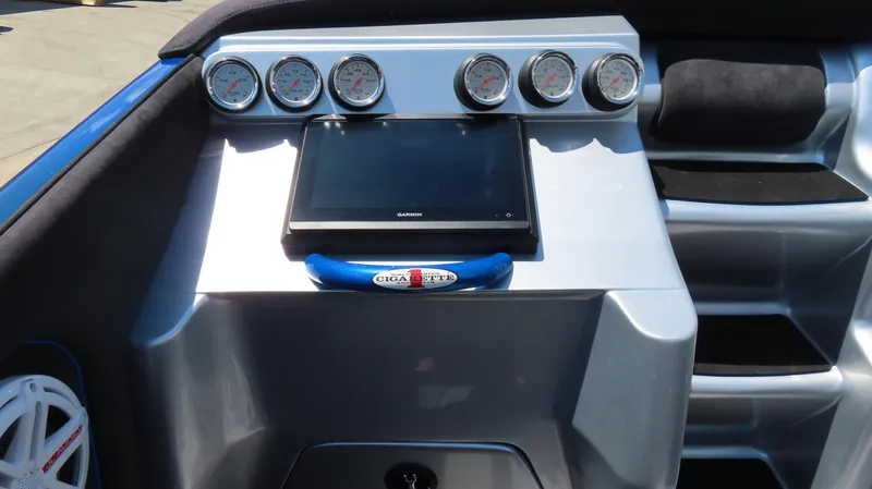 Slide: The Image of Dashboard of 2005 Cigarette 39' Top Gun Unlimited with gauges and Garmin display. - 19