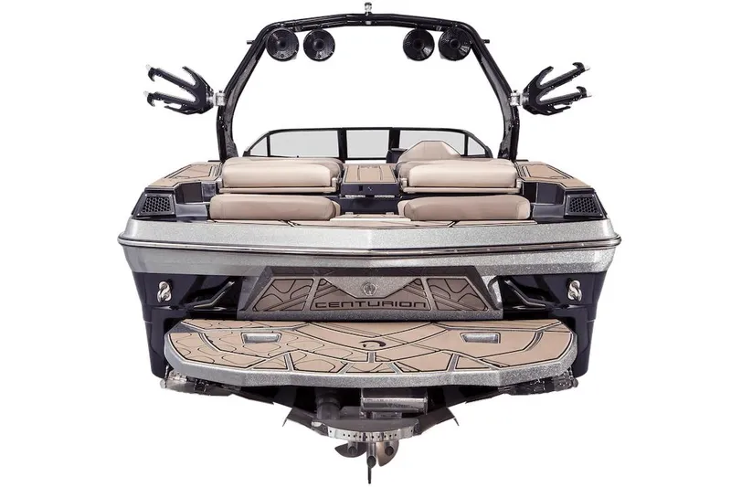 Slide: The Image of Manufacturer Provided Image: 2023 Centurion Fi23 boat, rear view, showcasing seating and wakeboard tower. - 23