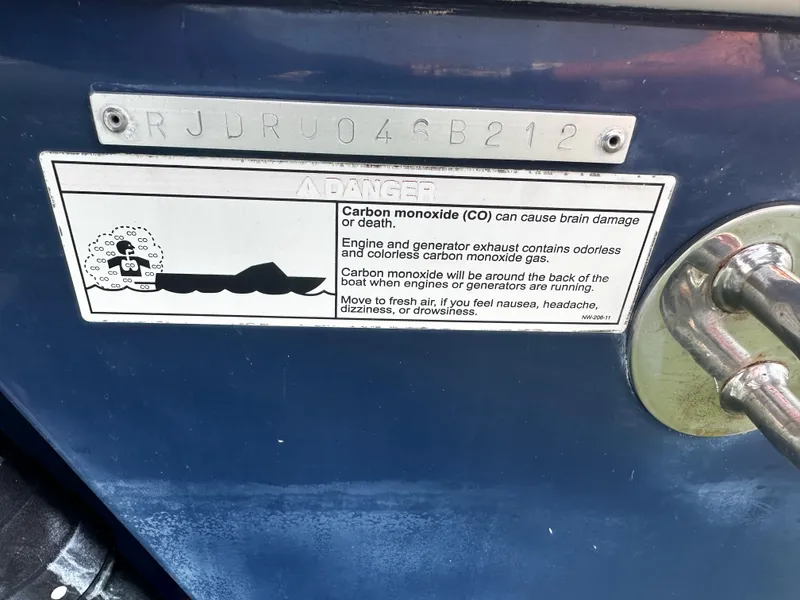 Slide: The Image of 2012 Everglades 295 Center Console with carbon monoxide warning label and identification plate. - 6