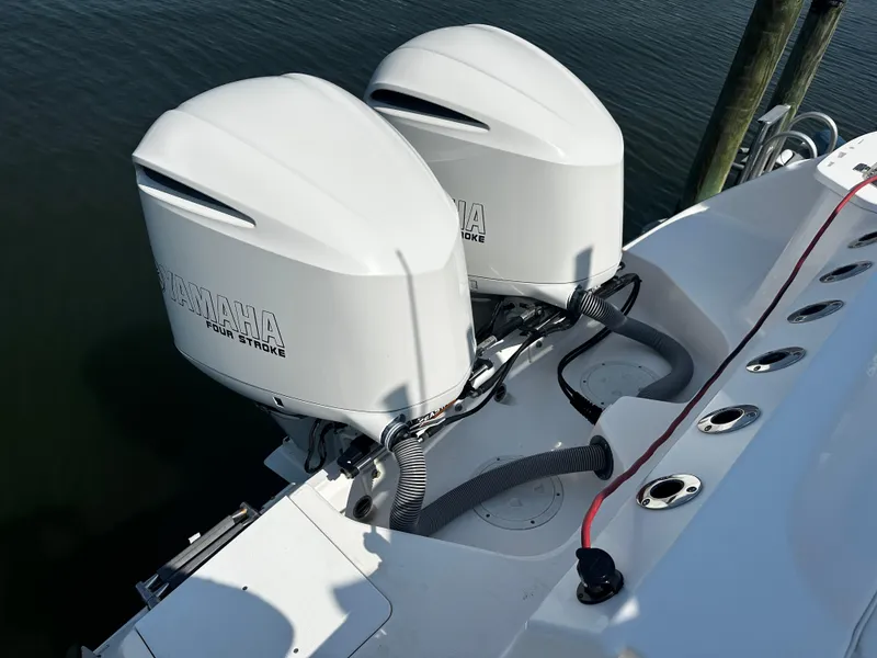 Slide: The Image of Twin Yamaha outboard engines on a 2012 Everglades 295 Center Console boat. - 7