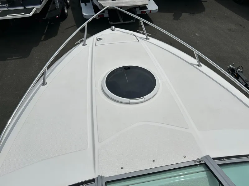 Slide: The Image of 2016 Regal 2250 Cuddy boat deck with hatch, viewed from above. - 14