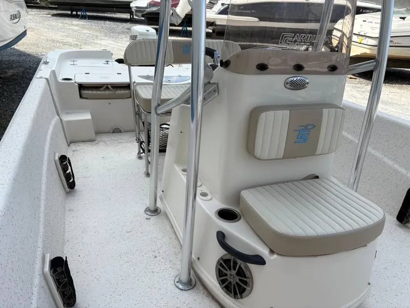 Slide: The Image of 2019 Carolina Skiff 198 DLV boat interior with seating and console. - 19