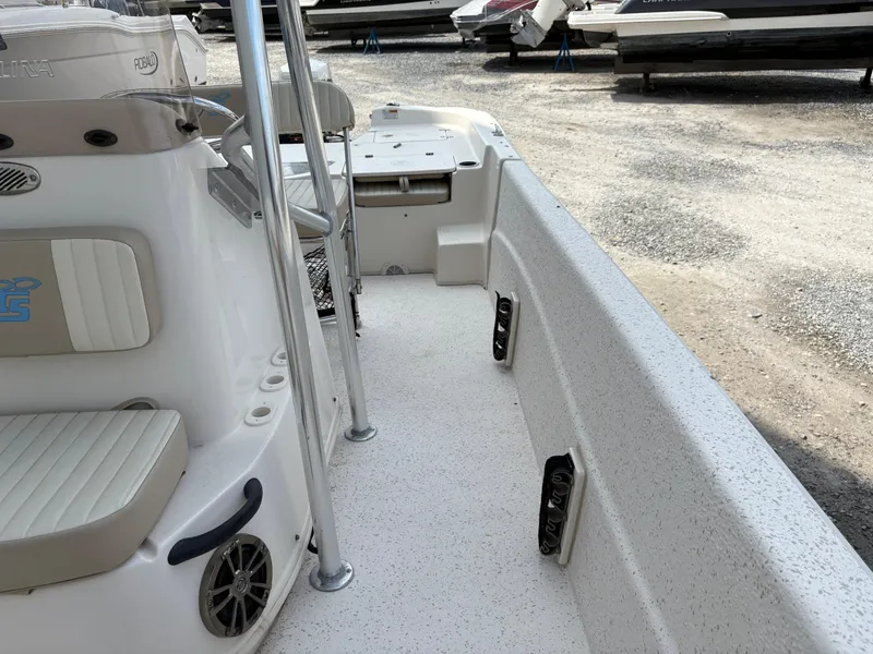Slide: The Image of 2019 Carolina Skiff 198 DLV interior view with seating and storage compartments. - 20