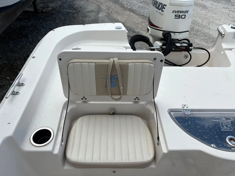 Slide: The Image of 2019 Carolina Skiff 198 DLV boat seat and Evinrude 90 engine detail. - 8