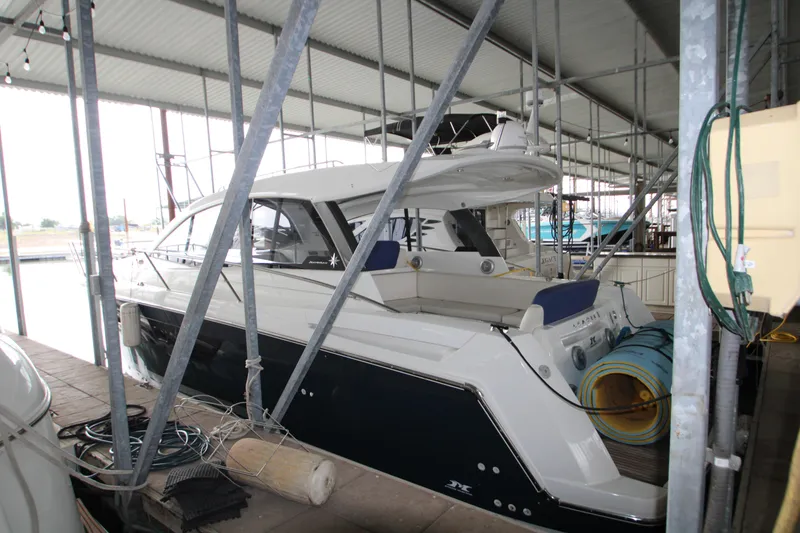 Slide: The Image of Interior of 2012 Jeanneau Leader 10 yacht with seating and TV. - 2