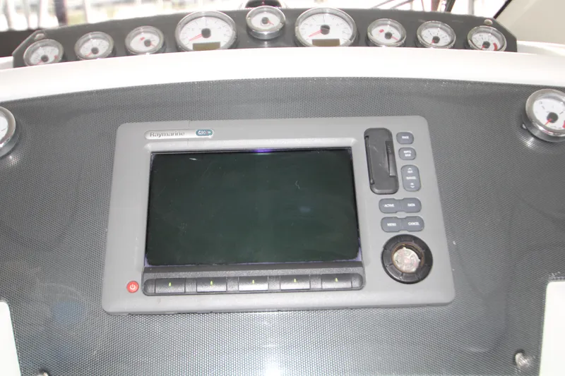 Slide: The Image of Control panel of a 2012 Jeanneau Leader 10 boat with Raymarine display and gauges. - 36