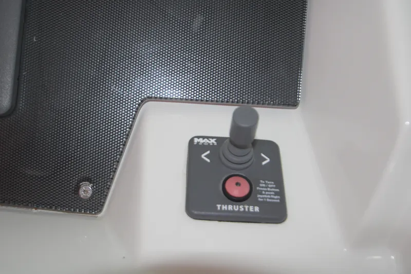 Slide: The Image of Joystick control panel on a 2012 Jeanneau Leader 10 boat. - 37