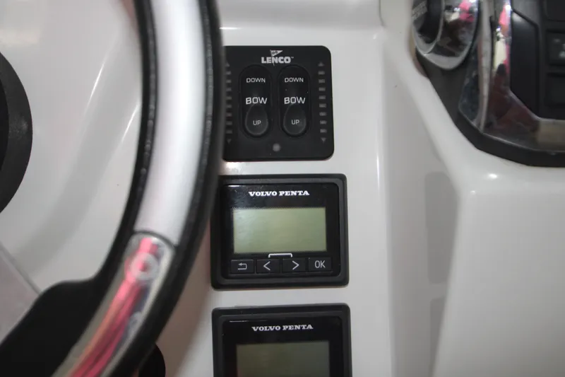 Slide: The Image of Control panel of 2012 Jeanneau Leader 10 with Lenco and Volvo Penta displays. - 39
