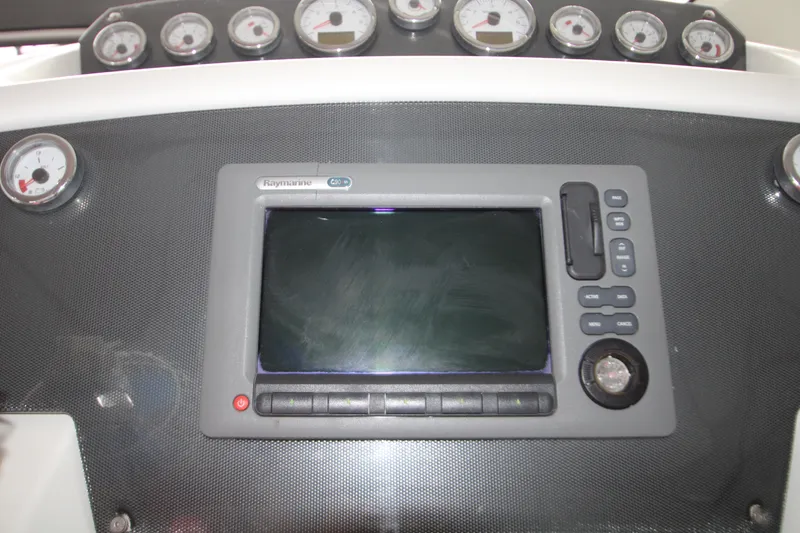 Slide: The Image of Control panel of a 2012 Jeanneau Leader 10 boat with Raymarine display and gauges. - 40