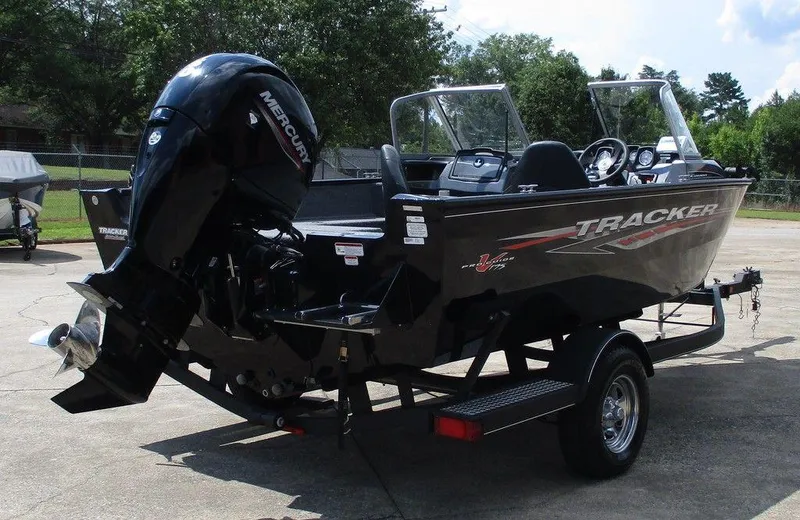 Slide: The Image of 2020 Tracker Pro Guide V-175 Combo boat on trailer, featuring Mercury outboard motor. - 6