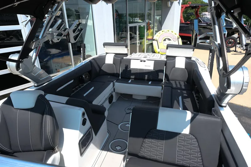 Slide: The Image of 2021 MasterCraft X26 boat interior with luxurious seating and modern design. - 30