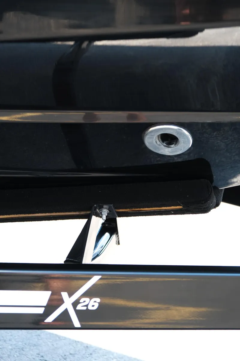 Slide: The Image of 2021 MasterCraft X26 boat detail, showcasing sleek design and branding. - 9