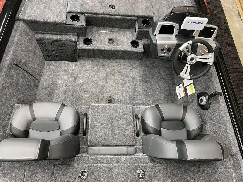 Slide: The Image of 2026 Tracker Pro Team™ 195 Tournament Edition boat interior with steering console and seating. - 7