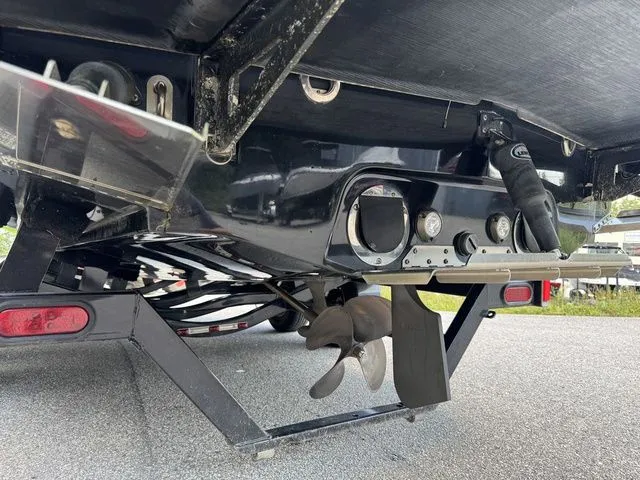 Slide: The Image of 2012 MasterCraft X-35 boat underside showing propeller and trailer details. - 21