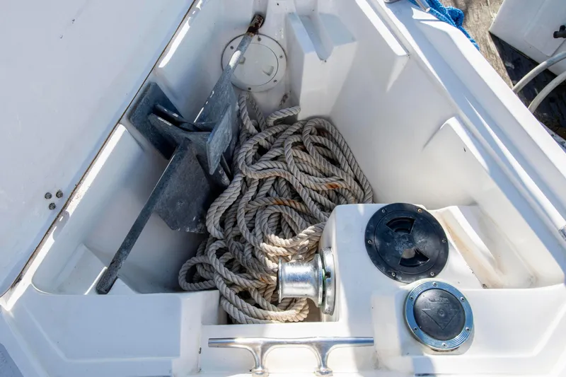 Slide: The Image of Anchor locker of 1993 Catalina 34 MK 1.5 with rope and anchor. - 12