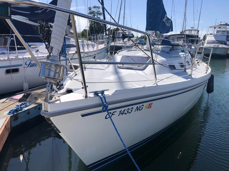 Slide: The Image of 1993 Catalina 34 MK 1.5 sailboat docked in marina, sunny day. - 21
