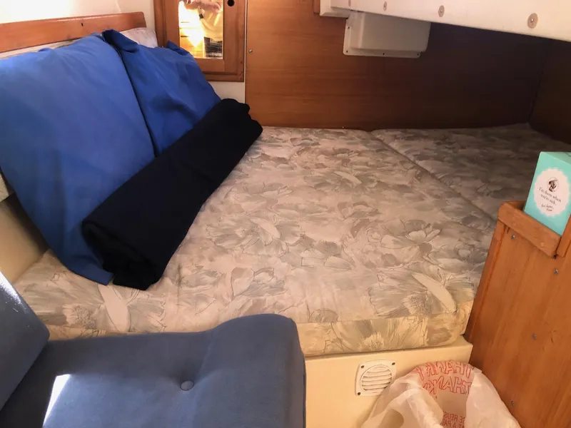 Slide: The Image of Cozy cabin interior of 1993 Catalina 34 MK 1.5 sailboat with floral bedding. - 8