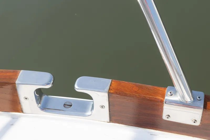 Slide: The Image of Polished metal and wood railing on 2005 Grand Banks Eastbay 43 HX boat. - 11