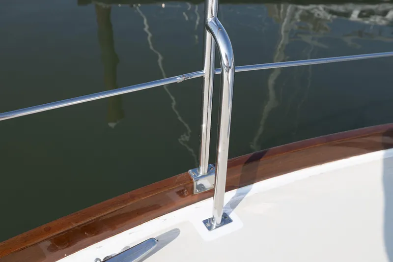 Slide: The Image of Close-up of 2005 Grand Banks Eastbay 43 HX boat railing and deck. - 12