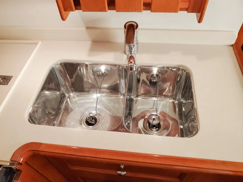 Slide: The Image of Stainless steel double sink in 2005 Grand Banks Eastbay 43 HX yacht kitchen. - 28