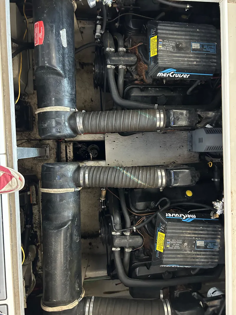 Slide: The Image of Engine compartment of a 1997 Cruisers Yachts 3575 Esprit with MerCruiser engines. - 10