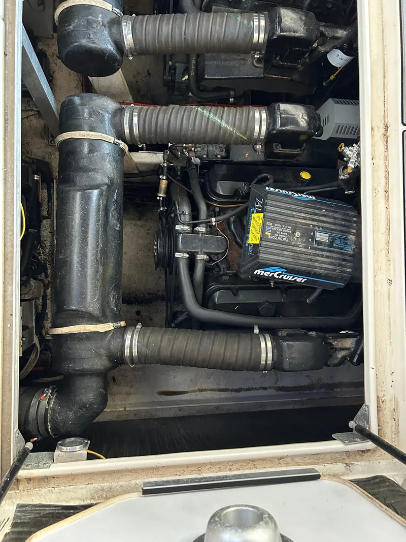 Slide: The Image of Engine compartment of a 1997 Cruisers Yachts 3575 Esprit with MerCruiser components. - 11