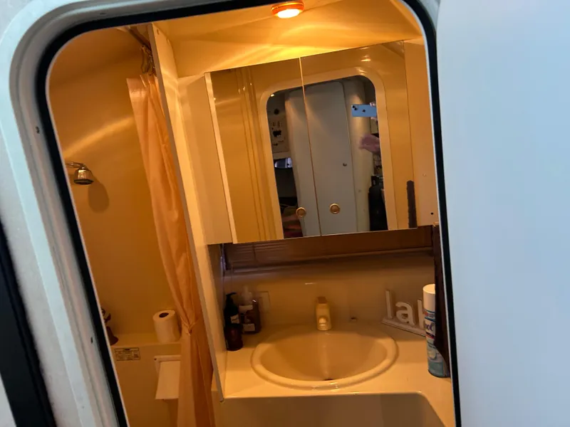Slide: The Image of Bathroom interior of 1997 Cruisers Yachts 3575 Esprit with sink and shower. - 19