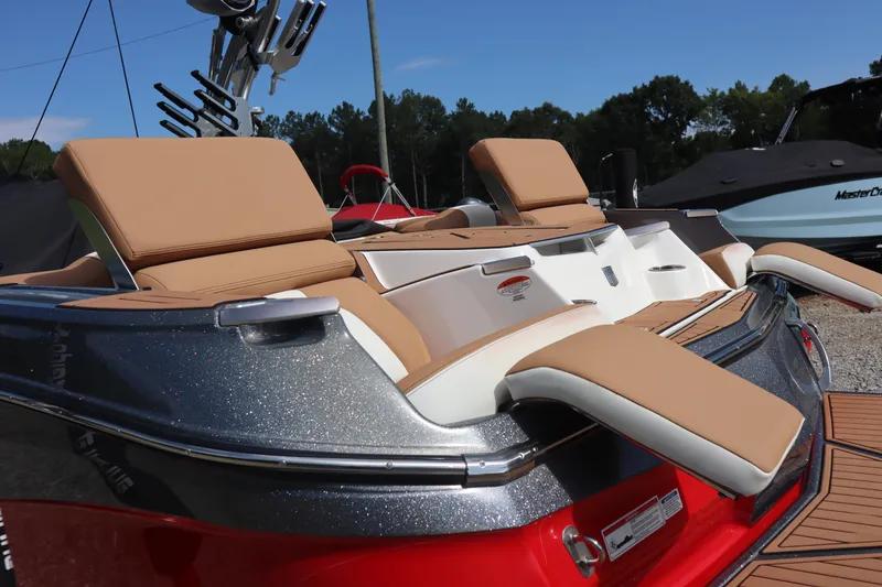Slide: The Image of 2020 MasterCraft X24 boat with tan seating and sleek design. - 18