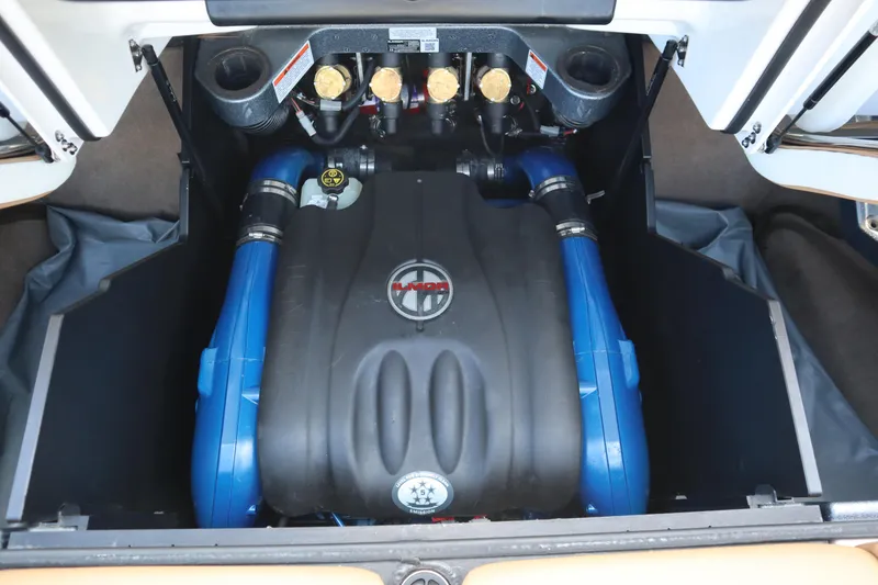 Slide: The Image of 2020 MasterCraft X24 engine compartment with Ilmor engine components visible. - 21