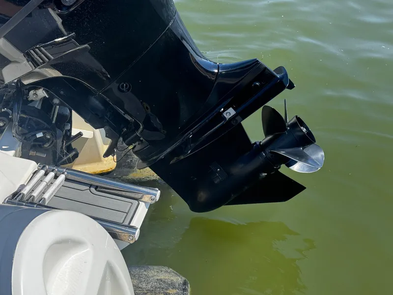 Slide: The Image of Outboard motor of 2022 Brig Eagle 6 boat in water. - 8