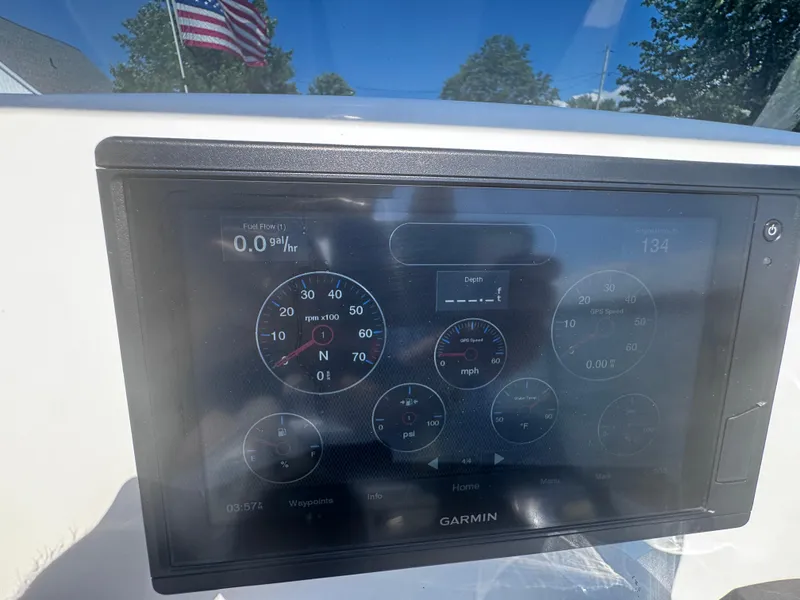Slide: The Image of Garmin display on 2022 Brig Eagle 6 boat showing fuel flow and speed metrics. - 24
