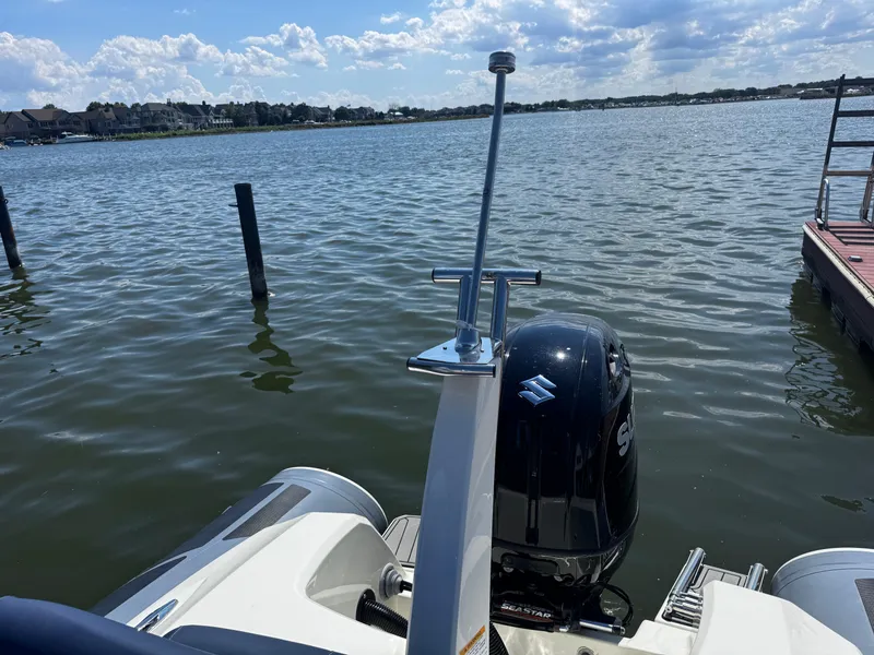 Slide: The Image of 2022 Brig Eagle 6 boat with Suzuki outboard motor on a sunny lake. - 28