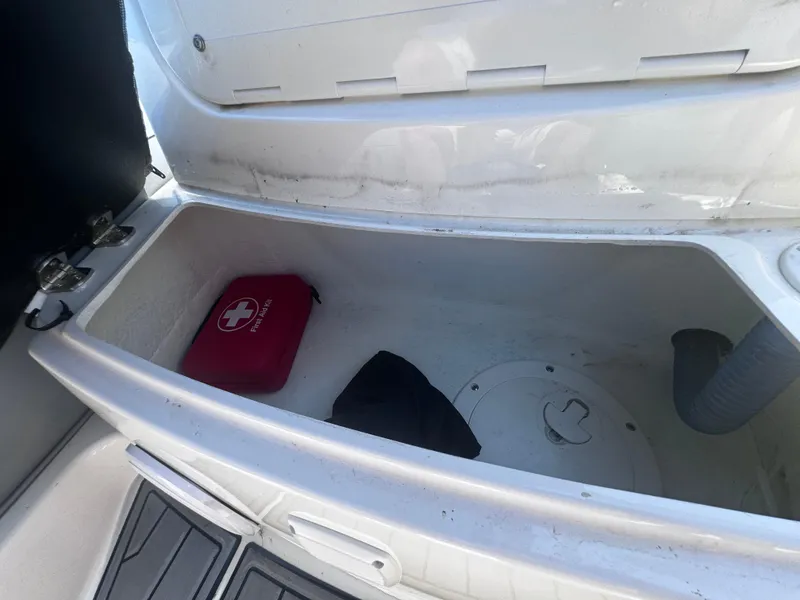 Slide: The Image of Storage compartment of 2022 Brig Eagle 6 with first aid kit inside. - 15