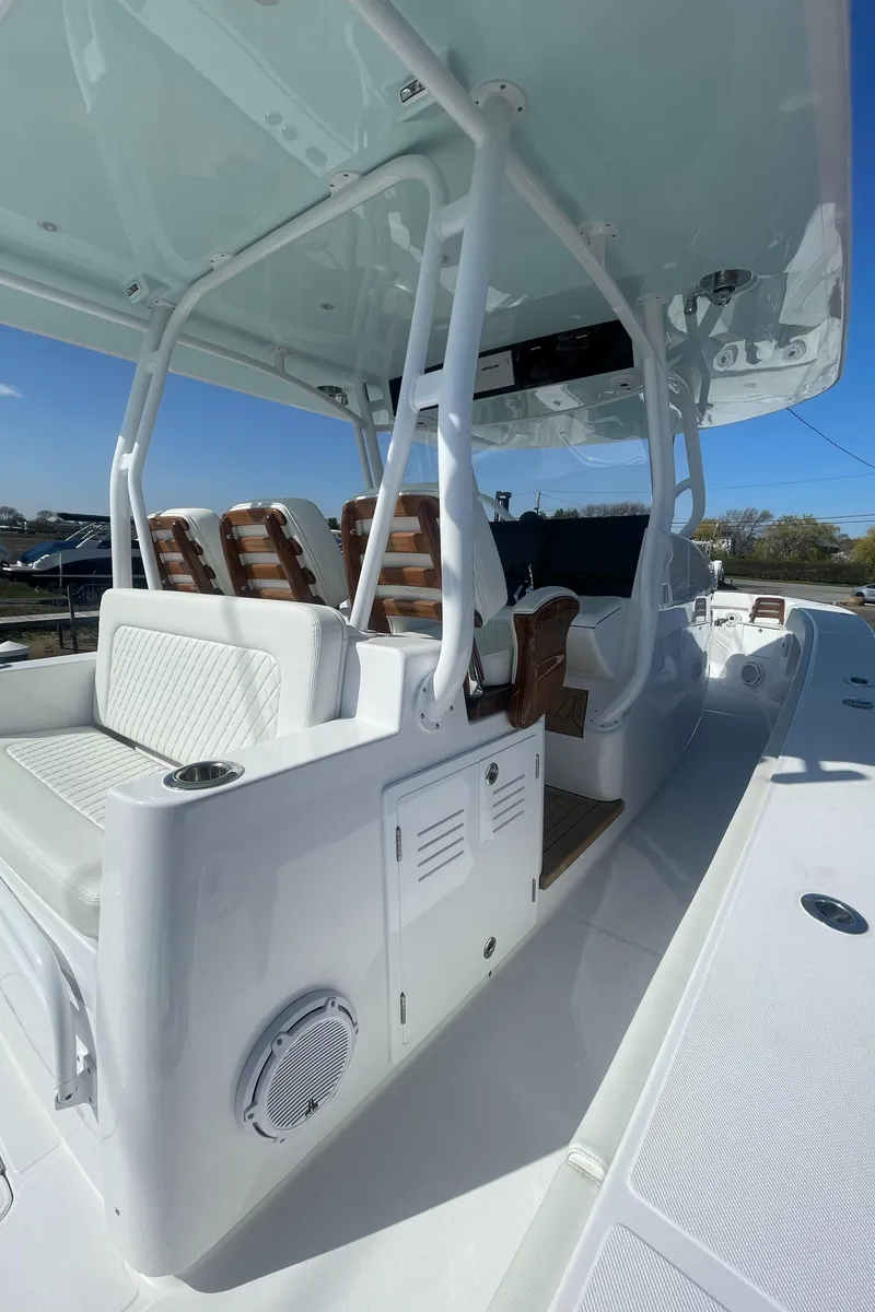 Slide: The Image of Jupiter 40 boat interior, 2023 model, featuring white seating and modern design. - 18