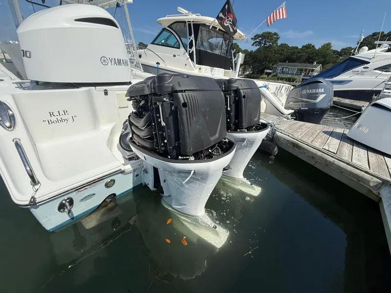 Slide: The Image of 2018 Sea Hunt Gamefish 30 with Yamaha engines docked at marina. - 27