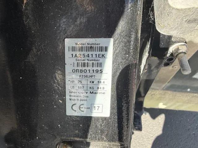 Slide: The Image of Close-up of a Mercury Marine engine label on a 1999 Lund SSV-16 Tiller boat. - 11