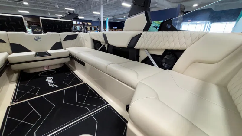 Slide: The Image of Luxurious interior of 2025 Tigé Z5 boat with cream leather seating and modern design. - 10