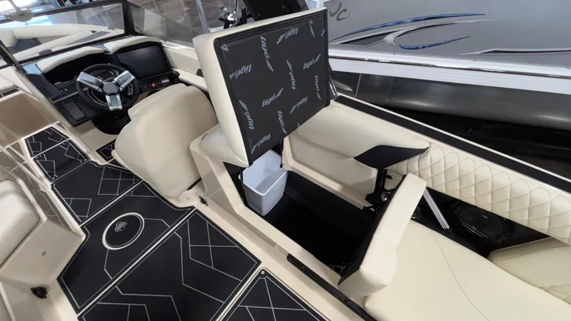Slide: The Image of 2025 Tigé Z5 boat interior with modern dashboard and luxurious seating. - 20