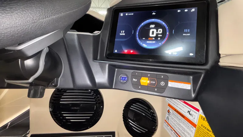 Slide: The Image of 2025 Tigé Z5 dashboard with touchscreen display and control panel. - 25