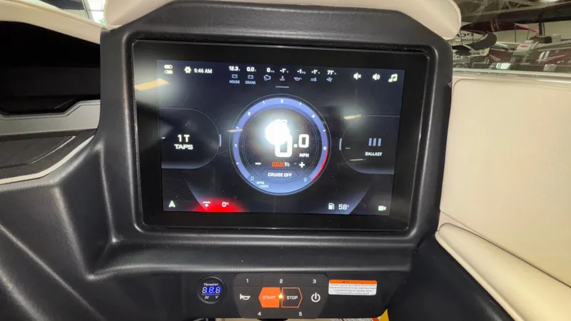 Slide: The Image of 2025 Tigé Z5 dashboard display showing speedometer and control settings. - 27