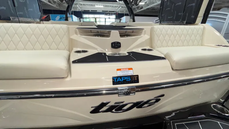 Slide: The Image of 2025 Tigé Z5 boat interior with diamond-stitched seating and TAPS 3T surf system. - 32